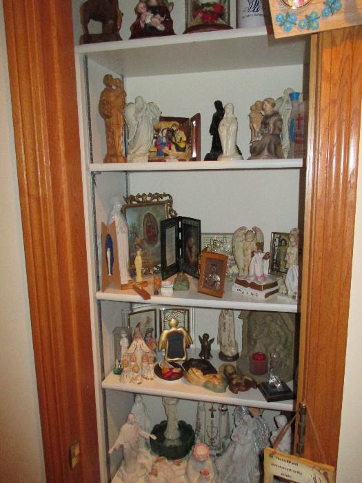 Closet overflowing with Religious items
