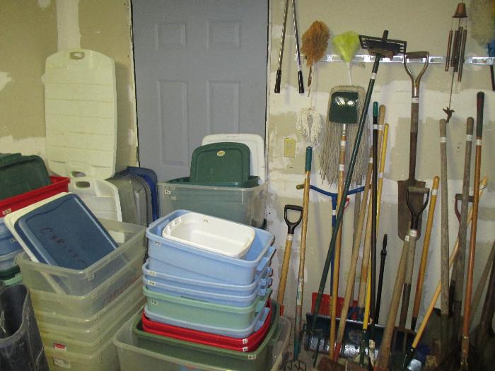garden tools and lots of storage bins