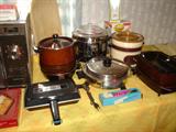 Small appliances; some appear to have never been used. Saladmaster heavy stainless steel electric skillet and electric percolator.