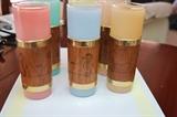 Cool vintage beverage glass set with carved wood.