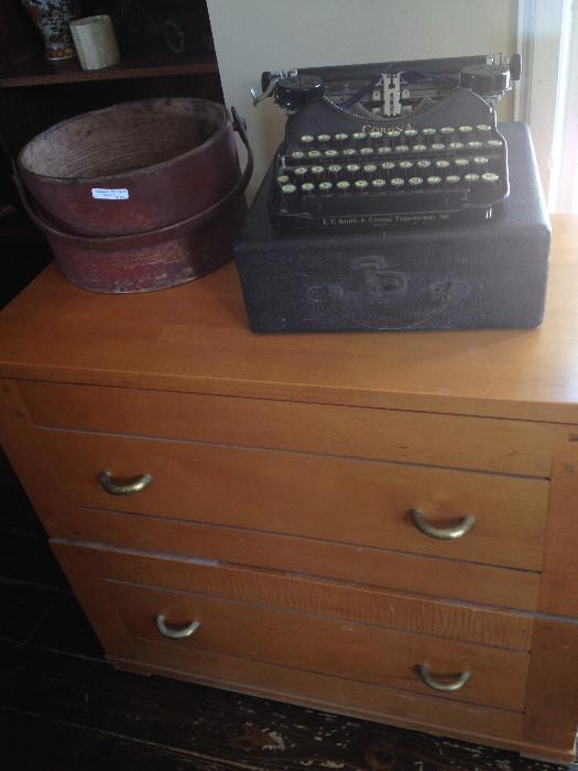 antique typewriter and shaker basket