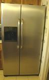 SIDE BY SIDE FRIGIDAIRE STAINLESS FRIDGE WITH DISPENSERS