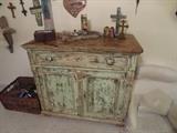 I LOVE this pieces.  Super versatile distressed chest cabinet