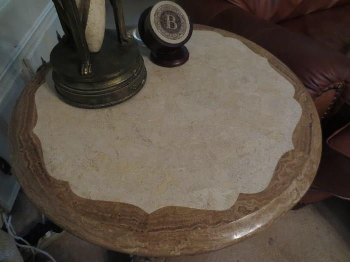 This table has a faux stone top (maybe siltstone??)
