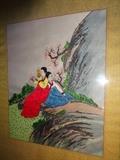 South Korean embroidered art depicting figures in red and blue garb. It is 28" high by 15" wide.