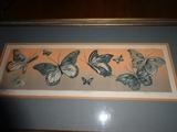 A serigraph by Mary Dinkins entitled "Butterflies" depicting the subject in muted autumnal tones. It is 26" wide by 14" high.