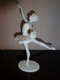 A piece by Kaiser W. Germany is from the 1990's and depicts a Ballerina posing made in porcelain. It is 10" high by 4' deep by 3" wide.