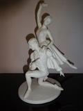 This Franklin Mint porcelain piece from the "Royal Ballet Sculpture" collection is entitled "Giselle" and depicts a male and female ballerina dancing. It is 10.5" high by 6" long by 5" wide.