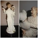 This porcelain piece by Giuseppe Armani is entitled "The Waltz" and depicts a couple dancing. Hand painted, it dates form 1998.