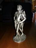 A limited pewter cast lover's nude by B. Z. Booker, number 4 of 3000. It stands 6" high by 3" wide.