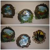 A set of 5 collector's plates entitled "Four Seasons of the Eagle." They are 9" in diameter.and One of them is an additional plate not part of the actual set and has feathers around the border.