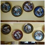 Photo 1 of 2: The Franklin Mint collectors set of 12 plates entitled "Heights of Freedom" in which bald eagles are depicted in various ways. The plates are 8" in diameter.