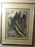 A print by Marc Chagall that is 19.5" high by 15.5" wide and depicts a couple in the foreground and a crowd behind a house in the background.