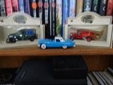 A set of three die cast cars in 1:43 scale. One is a 57 Thunderbird; and a Chevron commemorative edition made in England. #17 in a series of vintage vehicles, not in box but in good condition. One is a 1934 Dennis Fire Engine, refinery fire truck. The last is a 1939 Chevy Pick up RPM Motor