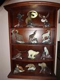 A collection from the Franklin Mint "Alaska Wildlife Conservation Trust" subscription series. It is a set of 12 animals in good condition except for the eagle on the top right which is missing a talon. All items are sold as is and all sales are final.