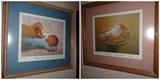 Two limited edition prints by Donald Zolan. Depicting a baby in each, they are number 336 of 1000 and signed by the artist. The frames are 17" by 14.5" for the child on plate and 16" by 14" for the child with the puppy. Sold as Set Only