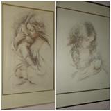 Two lithographs depicting a mother holding her child in a 22" by 28" frame. One is limited edition number 209 of 350 with Zapp as the artist. Sold as Set Only