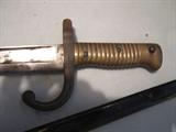 A sword/bayonet engraved "Culle Novembre 1874"