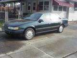 1994 Ford Taurus Dark Blue with Beige interior has 91,000 Grandma driven miles