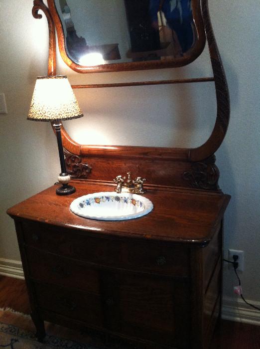 Good-looking antique dresser with sink conversion