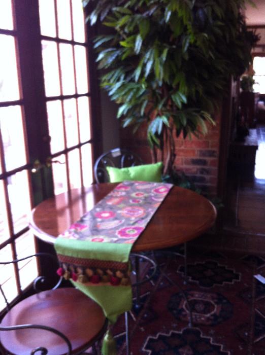 Bistro table/2 chairs; large artif. plant/ custom runner