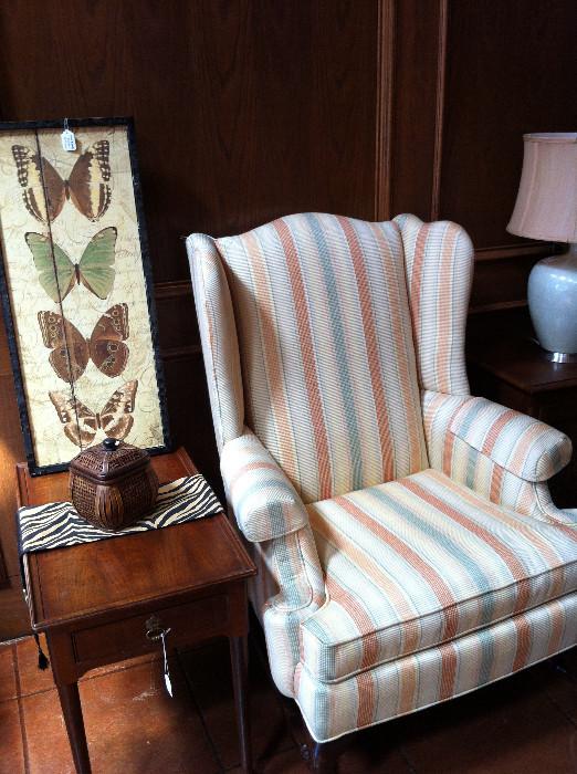       Pale yellow, peach, mint green wing-back chair