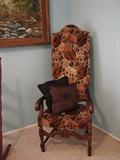 Accent chair in russet leaf design velvet.