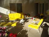 White Iron Grouping: Setee, 2 Chairs, Lounger, side table all with yellow pads