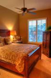 Century Queen Panel Bed with Footboard & Rails, Lady American Queen Double Pillowtop Mattress, Century Bedside tables with marble tops, Stiffle Brass lamps, antique Armoire