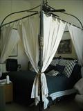 Iron King Canopy Bed with Ralph Lauren bedding