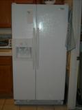 Double door refrigerator with water & ice on door. Less than 1 year old