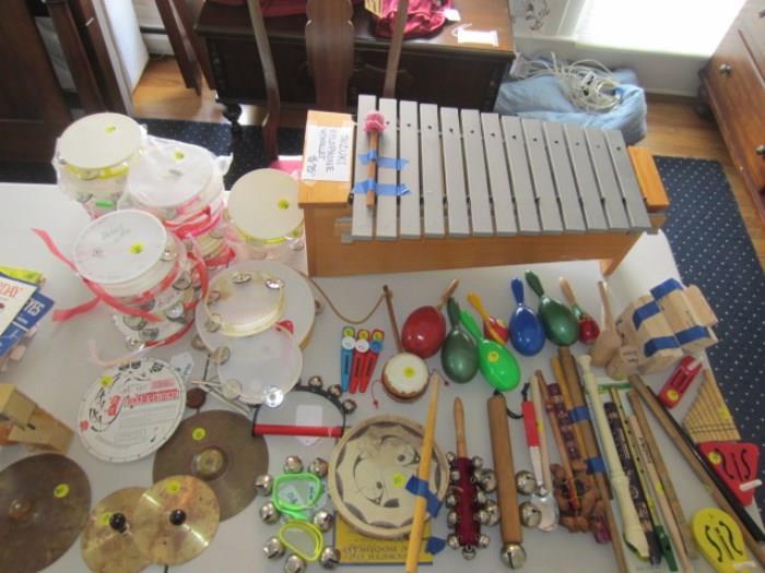 Musical instruments including flutes, cymbals, xylophone.  Many childrens instruments.