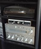 Sony PS-X500 direct drive turntable (w/ original box), the Beam Box by B.I.C. electronic FM antenna, Yamaha CT-410 II AM/FM stereo tuner, Yamaha CA-410 II stereo amplifier + black stereo cabinet with glass door