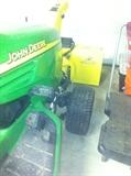 John Deere Tractor with snowblower and mower attachments