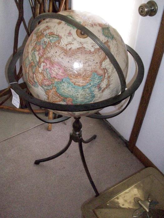 World globe on iron stand
