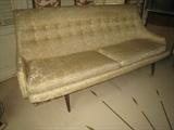 Fabulous and sturdy 1960 sofa with sweeping scoop design - rated "VC" 
(VERY COOL). Priced to sell, too.