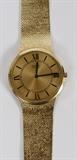 Lot#2109, 14KT GOLD SEIKO GENTLEMAN'S WATCH, L 8"Having a quartz dial, with Roman numerals; #906762. Having a mesh strap. Measuring L. 8", with an approximate total weight of 61 grams.