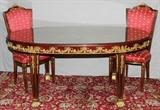 Lot#2122, FRENCH STYLE OVAL DINING TABLE, H 31.5", L 72", D 44"Having ormolu flower and vine design at the apron, paw feet and a glass top.  The two chairs have ormolu enhancements with red upholstery and gold bumble bee design.