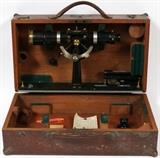Lot#29, GURLEY SURVEYOR'S TRANSIT AND TRIPOD STAND H 8"W. & L. Gurley transit in fitted case with level and a tripod stand, 55" H.