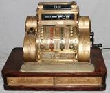 Lot#30, NATIONAL CASH REGISTER, BRASS DESIGN WITH OAK BASE H 24" W 30" D 18"Model # 442-EL-2C. Serial # 1266091 W.  Brass plate over iron.