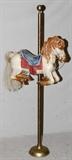 Lot#37, DECORATIVE MINIATURE COMPOSITION CAROUSEL HORSE, H 20", W 29"Pole size H. 67", L. 29". Decorative hand painted flowers, pearls and horse hair. Horse H. 20 1/2" X 29".