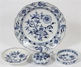 Lot#58, MEISSEN PORCELAIN SOUP PLATE, TEA SAUCER, DISH AND COVERED POT DE CRÈME 4 PCS//includes one blue onion soup plate, 10 1/2" Dia., one blue flower, tea saucer, 5 1/2" Dia., one blue flower dish, 4 1/2" Dia., one blue onion covered pot de crème, 4 1/2" Dia. Crossed sword marks on undersides.