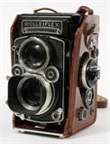 Lot#148, FRANKE & HEIDECKE, ROLLEIFLEX CAMERA, H 6" W 3"Carl Zeiss lens, #NR4146274, Planar 1:3.5, f=75mm. Heidosmat, 1:2.8/75, No. 3075873. Made in Germany. Fitted with the original leather case. Measures H. 6" x 3" x 5". Includes, a Weston Master II, Universal Exposure meter.