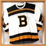 Lot#165, BOBBY ORR AUTOGRAPHED CCM, 1991-1992, BOSTON BRUINS WHITE JERSEY//Bobby Orr white 1991-1992 autographed jersey with "Orr" name sewn on back above #4 and autographed on both front and back of Jersey inscribed: "To Ed Best Regards Bobby Orr". Mounted in a shadow box frame with clear Plexiglas on both front and back.