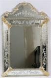 Lot#1089, VENETIAN STYLE WALL MIRROR, 33" X 22"Surrounded by etched mirrored panels with glass flower and ribbon designs.