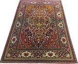 Lot#1099, PERSIAN HAND WOVEN RUG, 6' 8" X 4' 10"Having an all over stylized leaf and floral motif, with navy field and a red border.