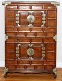 Lot#1181, CHINESE NATIVE WOOD DOUBLE CHEST, H 54" W 38"Four drawers above two pairs of cabinet doors. Fitted with brass hardware.