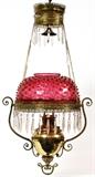 Lot#1229, VICTORIAN CRANBERRY HOBNAIL GLASS HANGING OIL LAMP, 19TH C., H 34" OVERALL//Having a hobnail cranberry glass shade, hung with crystal prisms. 19th Century. Measuring H. 34", with a 12" diameter.