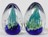 Lot#1448, CRYSTAL PAPERWEIGHTS, TWO, H 3 1/2"Ovoid form blown glass paperweights in cobalt blue, green and turquoise.