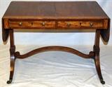 Lot#2265, SHERATON MAHOGANY DROP LEAF PARLOR TABLE ON CASTORS, C. 1800-1830, H 27'', W 24'', L 58''Mahogany with fruitwood border, two drawers and brass pulls; faux drawers on other side; double pedestal with splayed legs.
